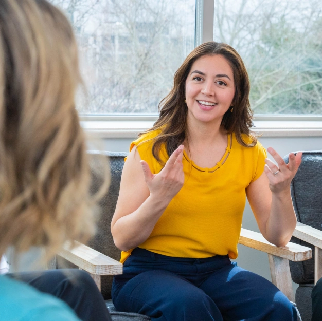DentalQore employee explaining dental marketing options