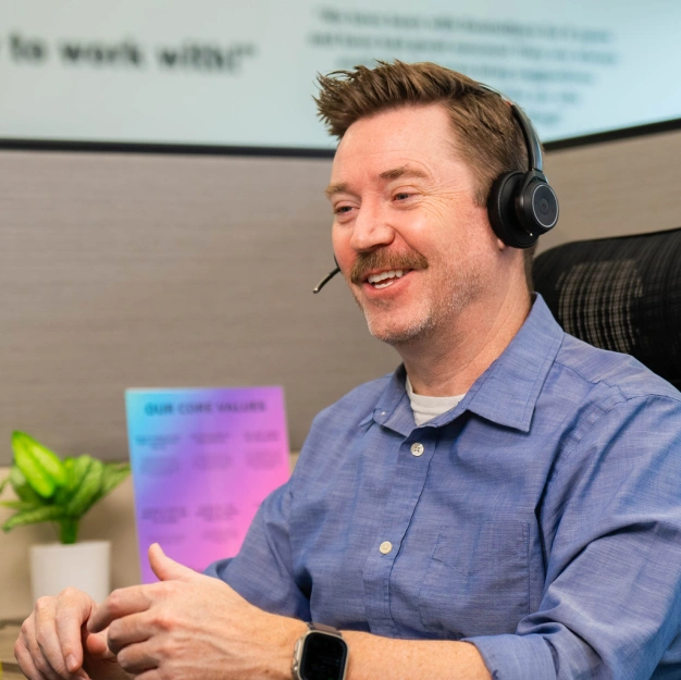 DentalQore representative smiling at work